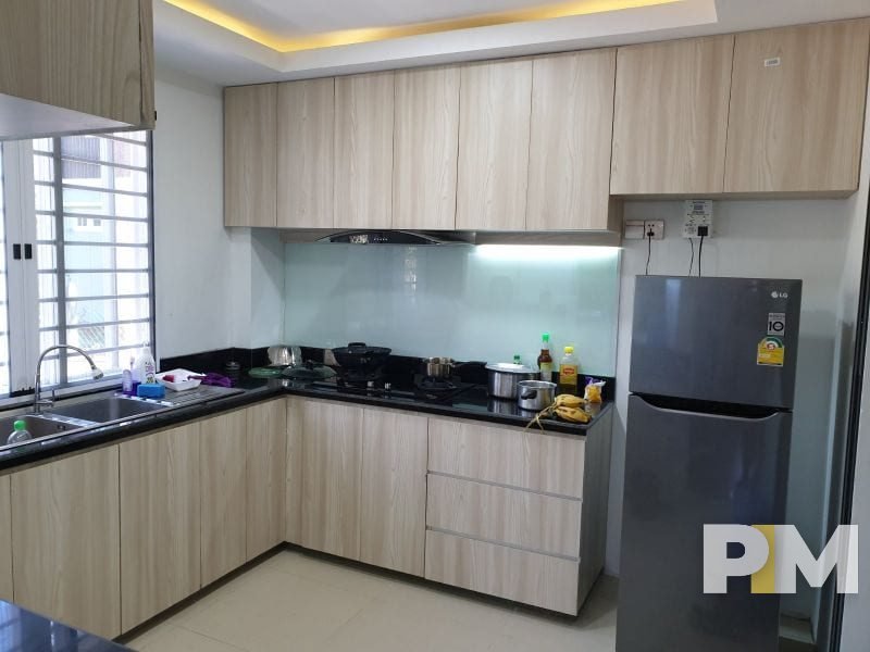 kitchen with fridge - properties in Yangon