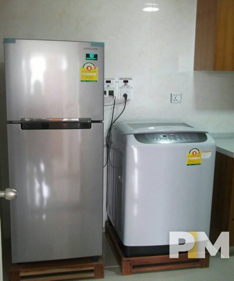 kitchen with fridge - property in Yangon