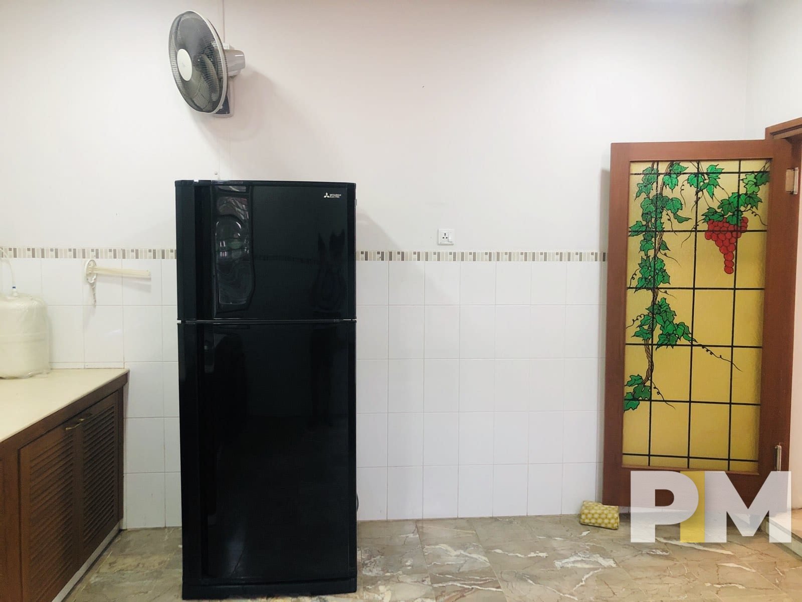 kitchen with fridge - property in Yangon