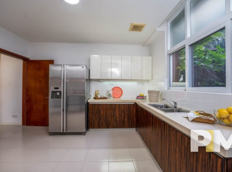 kitchen with fridge - property in Yangon