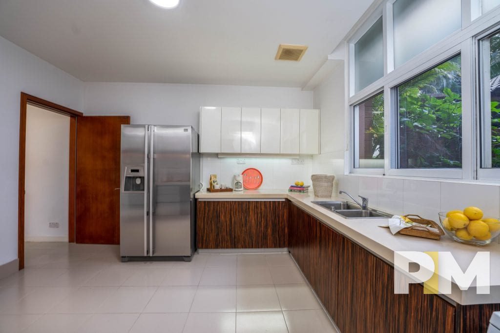 kitchen with fridge - property in Yangon