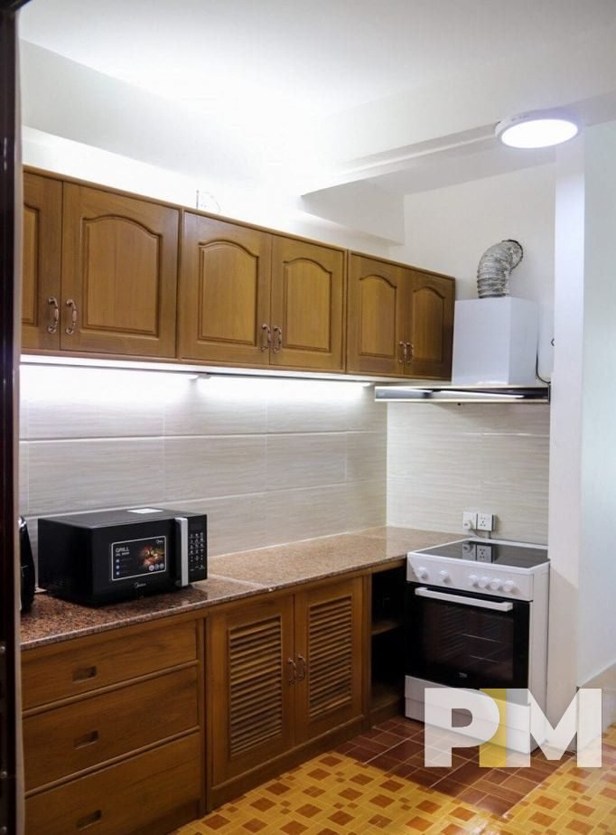 kitchen with microwave - property in Yangon