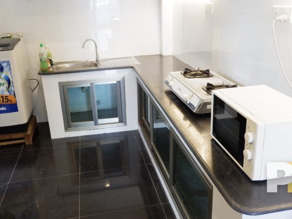 kitchen with microwave - property in Yangon