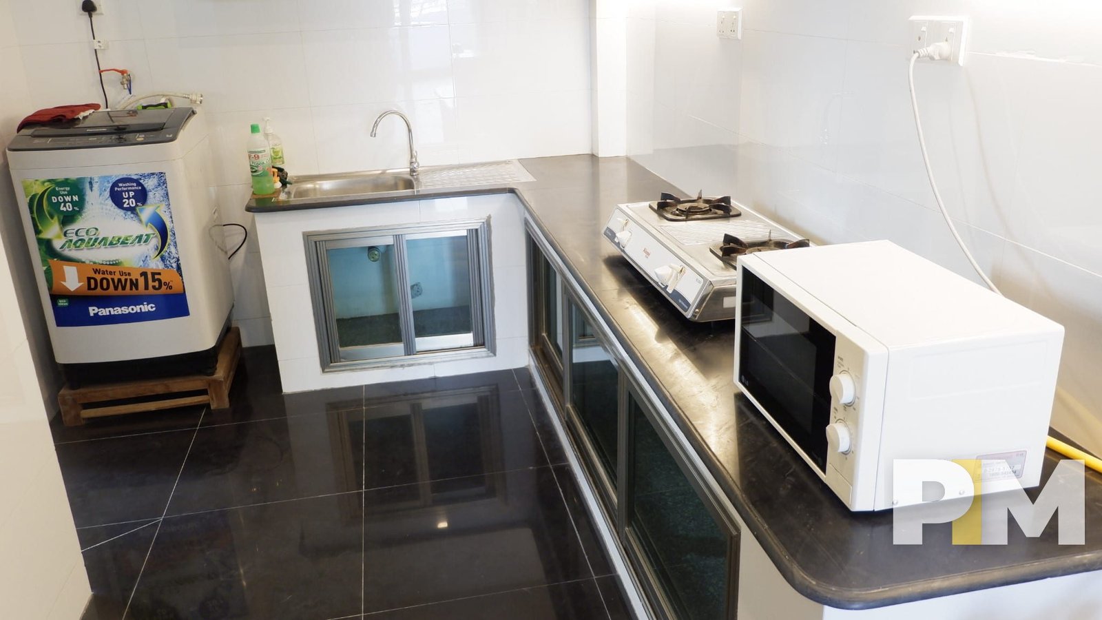 kitchen with microwave - property in Yangon