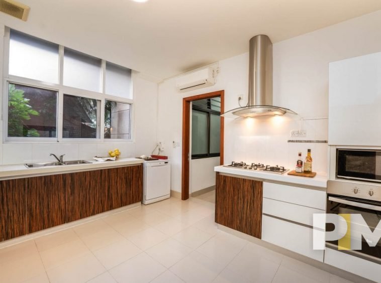 kitchen with stove - properties in Yangon