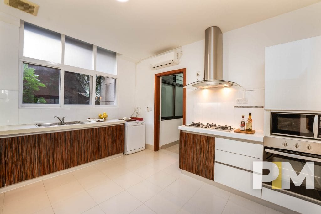 kitchen with stove - properties in Yangon