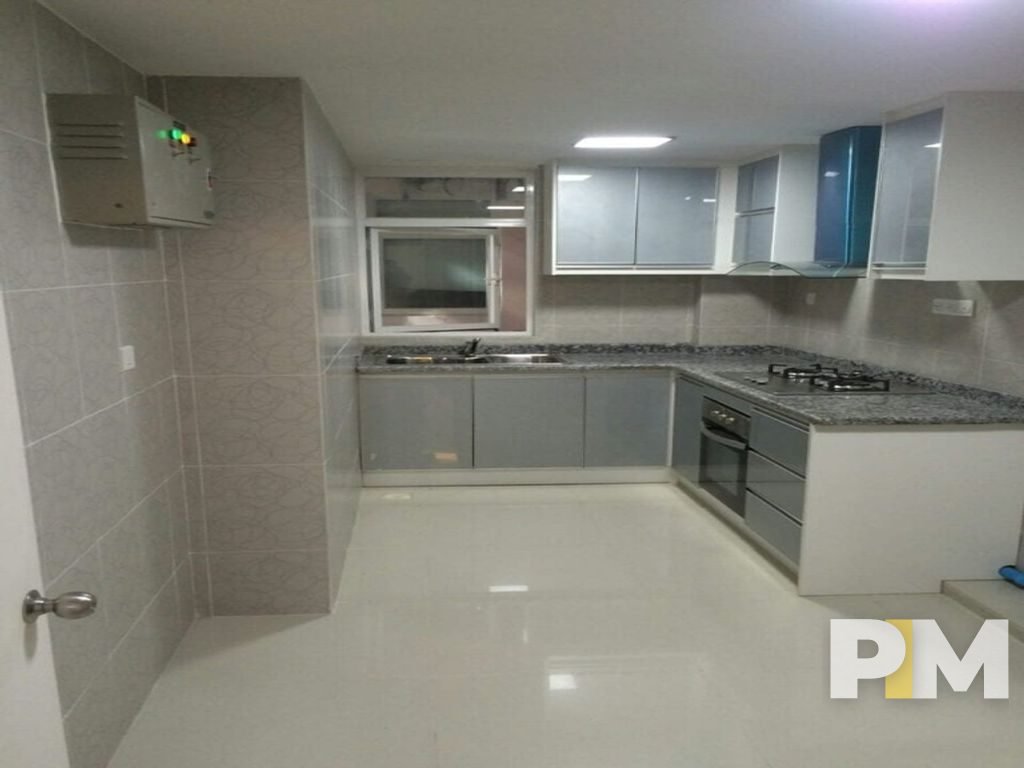 kitchen with stove - property in Yangon