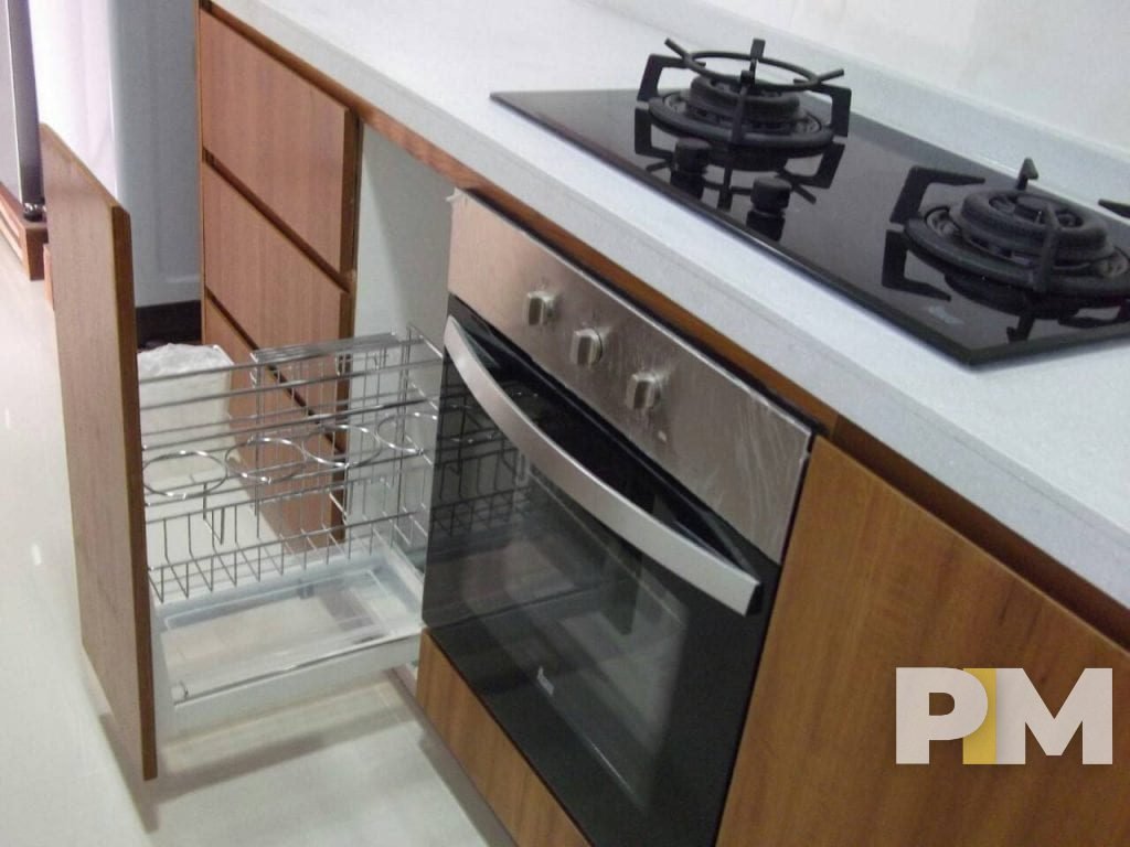 kitchen with stove - property in Yangon