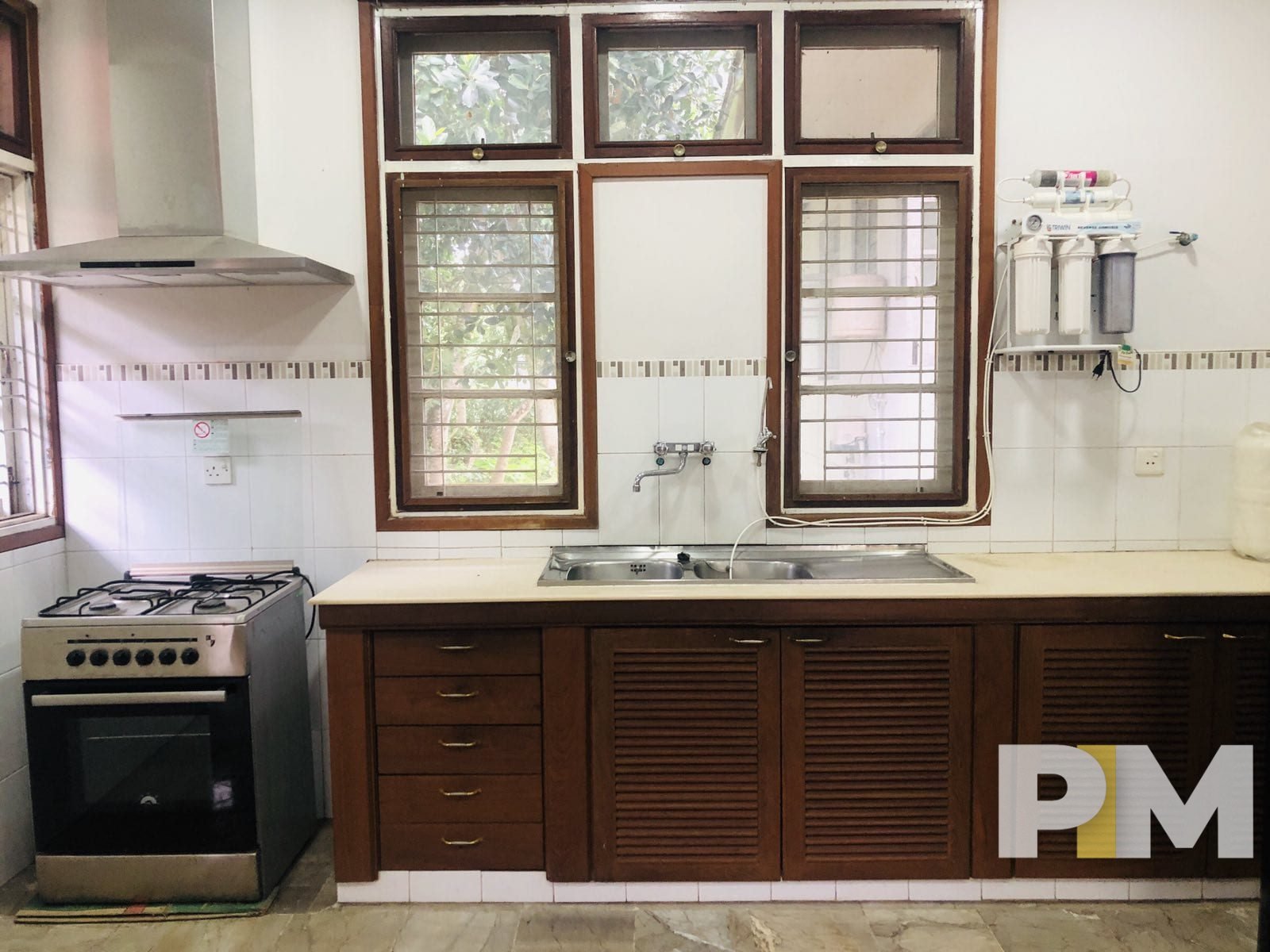 kitchen with stove - property in Yangon