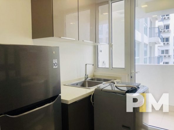 kitchen with washing machine - Myanmar Real Estate