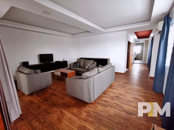 living room with TV - properties in Yangon
