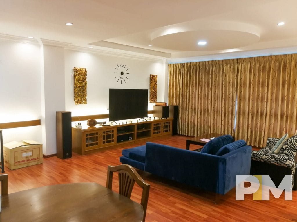 living room with TV - property in Yangon