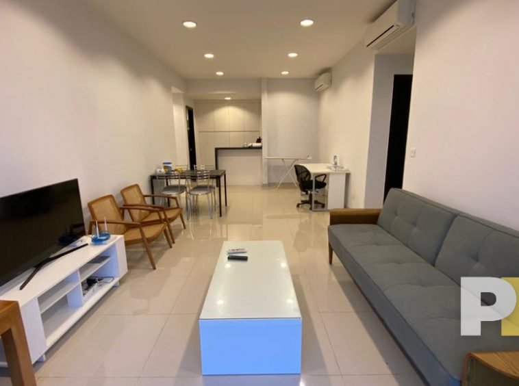 living room with TV - property in Yangon