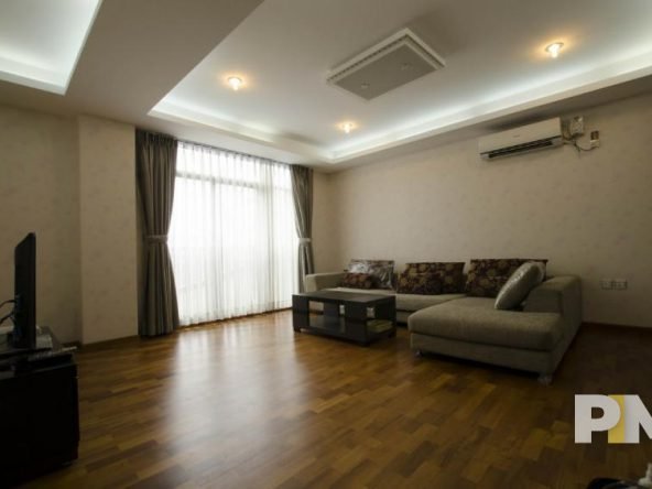 living room with TV - property in Yangon