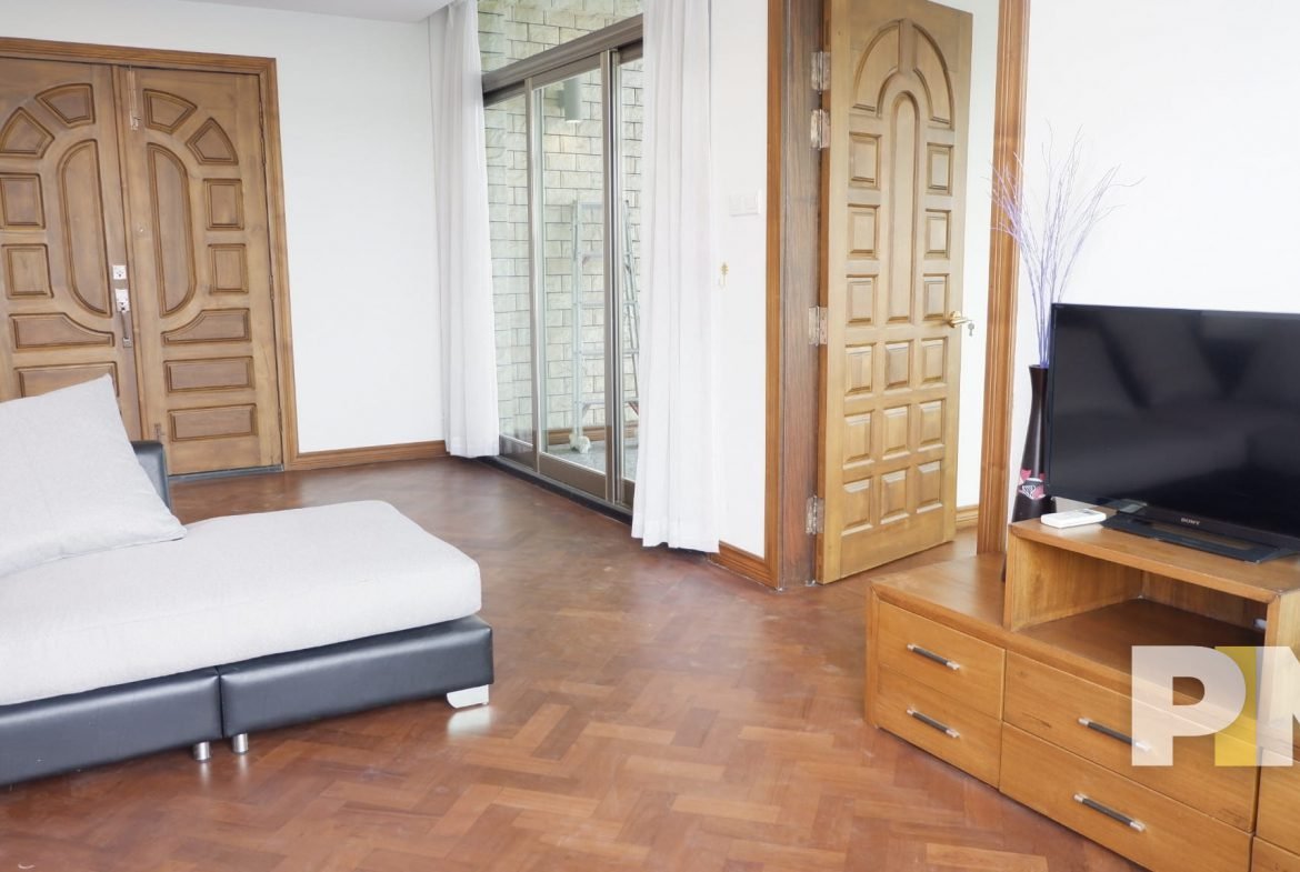 living room with TV - property in Yangon