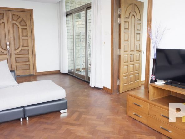 living room with TV - property in Yangon