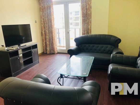 living room with TV - property in Yangon