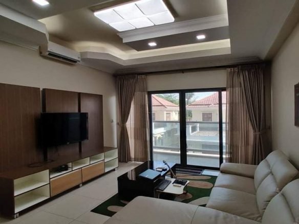 living room with TV - property in Yangon