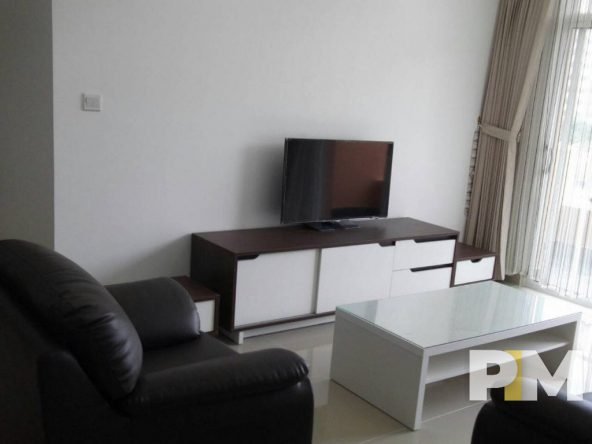 living room with TV - property in Yangon