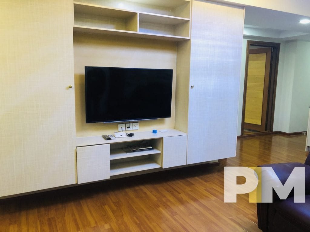 living room with TV - property in Yangon