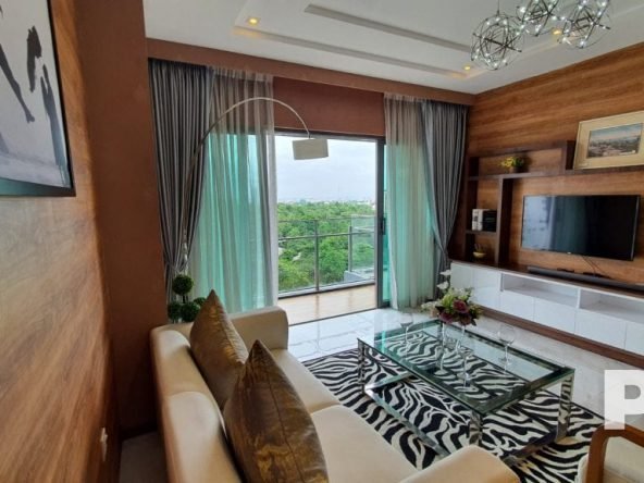 living room with TV - property in Yangon