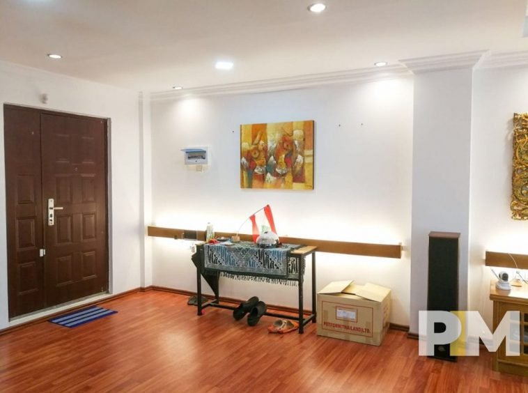 living room with a wall art - Yangon Real Estate