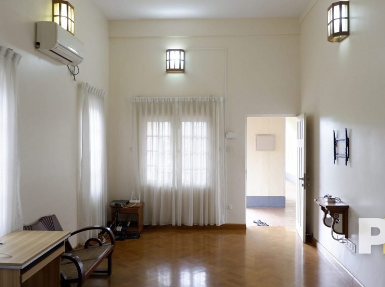 living room with chairs - properties in Yangon