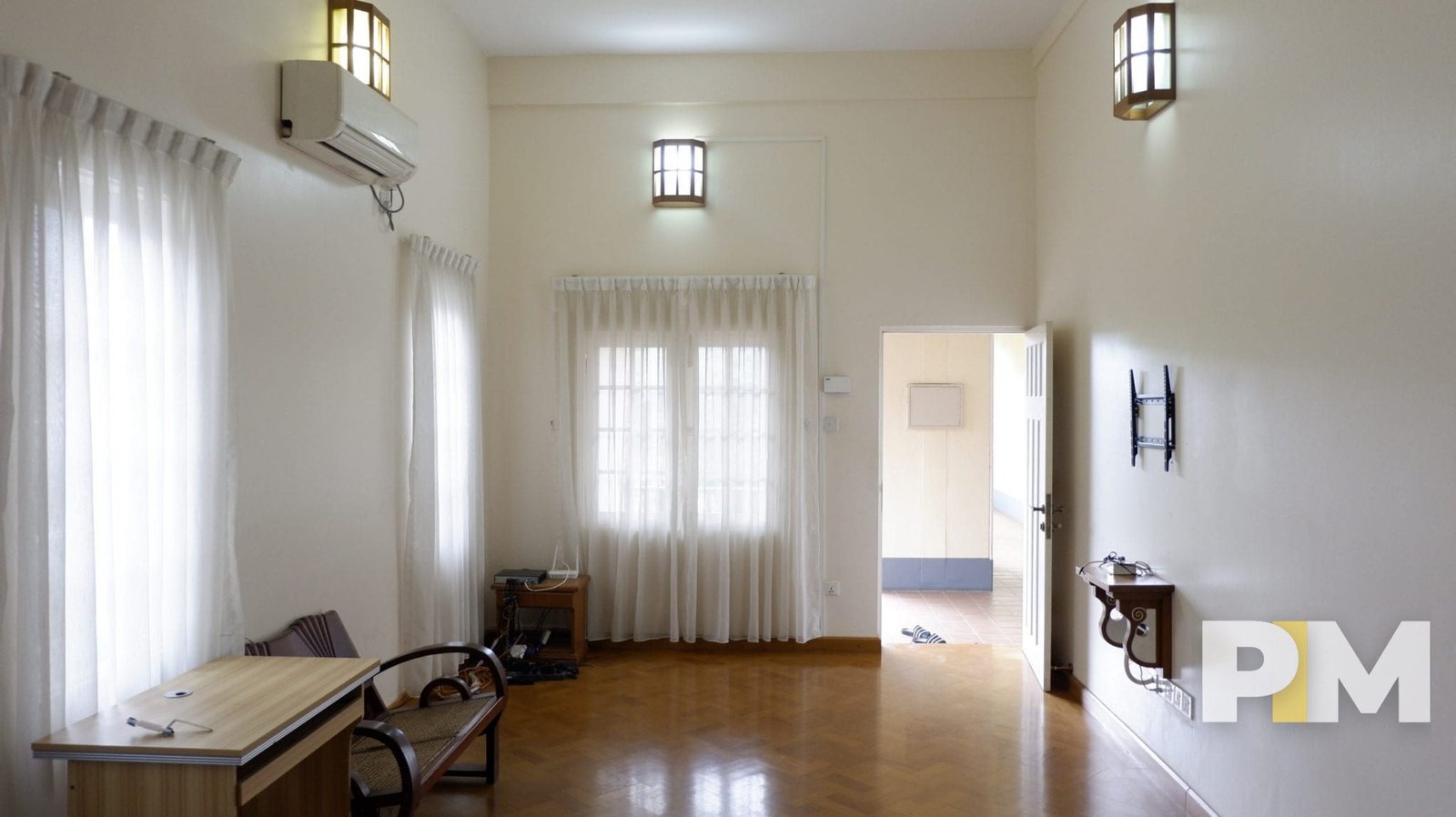 living room with chairs - properties in Yangon