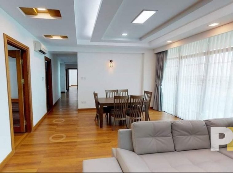 living room with dining table and chair - property in Yangon