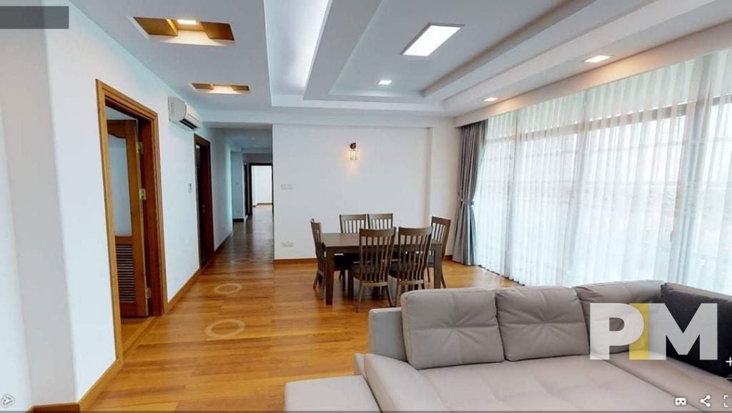 living room with dining table and chair - property in Yangon