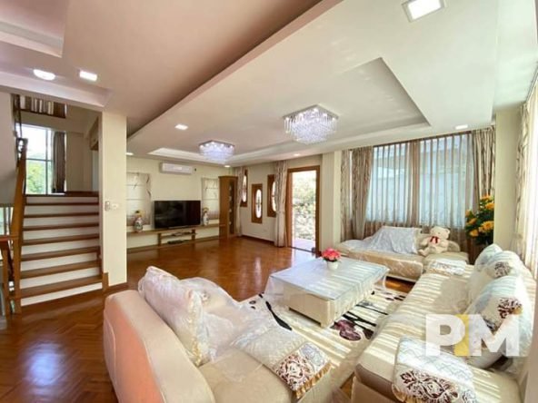 living room with safa set and TV - Myanmar Real Estate