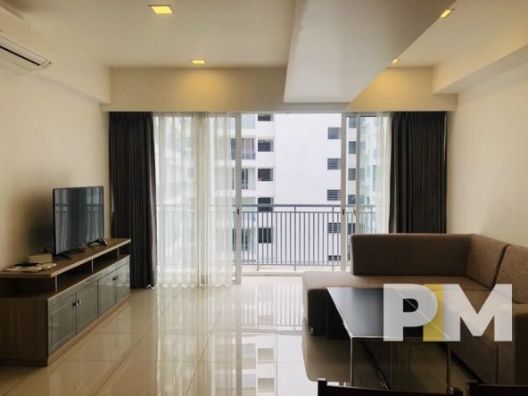 living room with sofa and TV - Condo for rent in Yankin