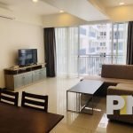 living room with sofa and TV - Myanmar Real Estate