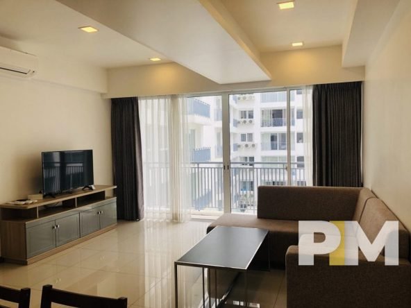 living room with sofa and TV - Real Estate In Yangon