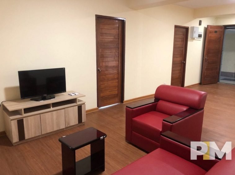 living room with sofa - property in Yangon