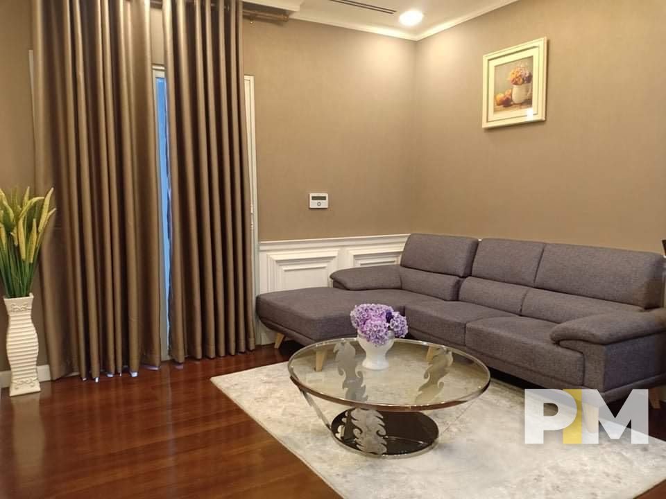 living room with sofa - property in Yangon