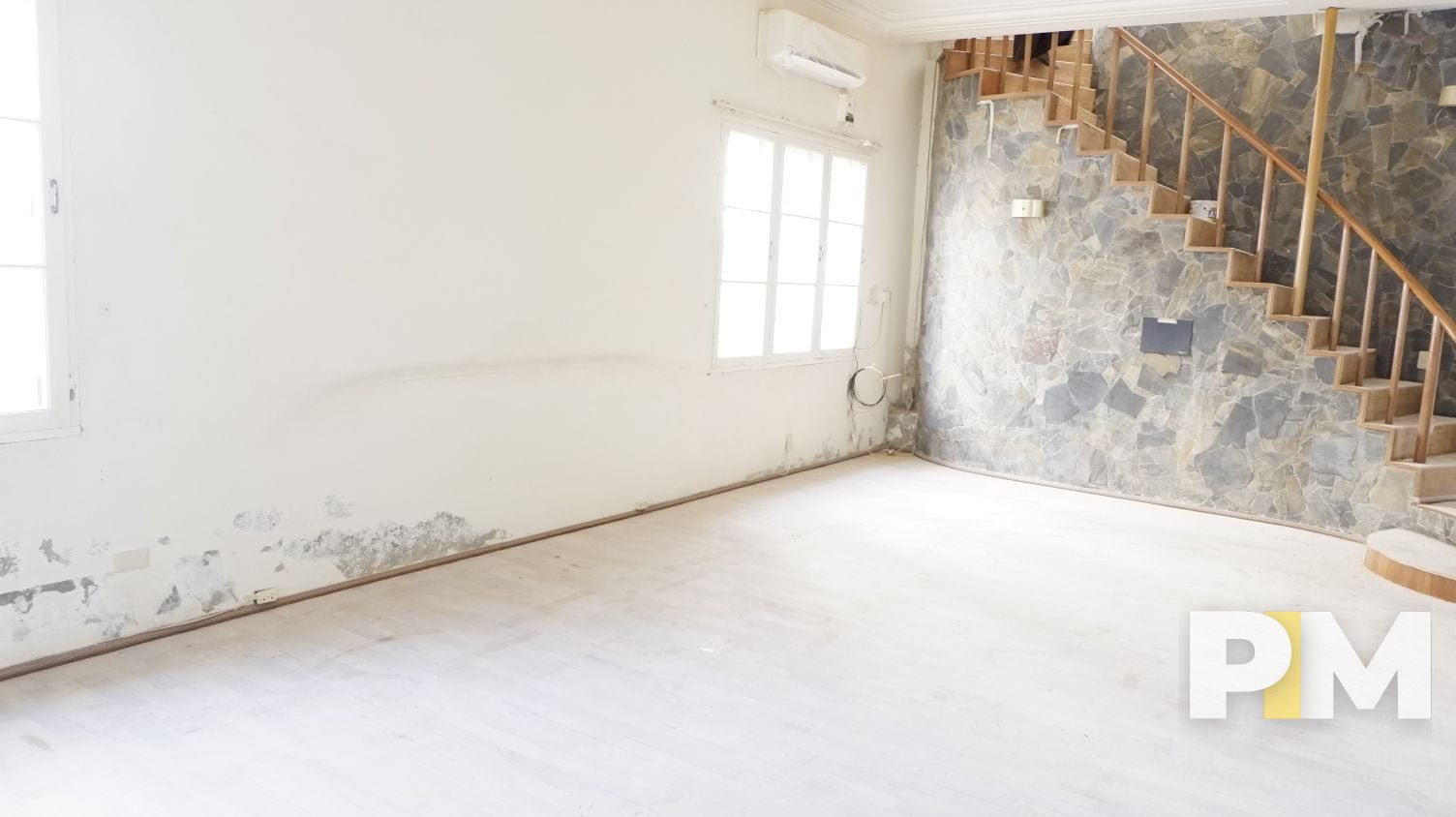 living room with staircase - Myanmar Real Estate