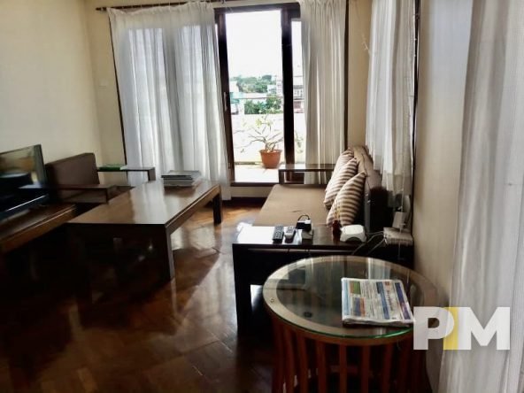 living room with table and seat - Real Estate in Myanmar