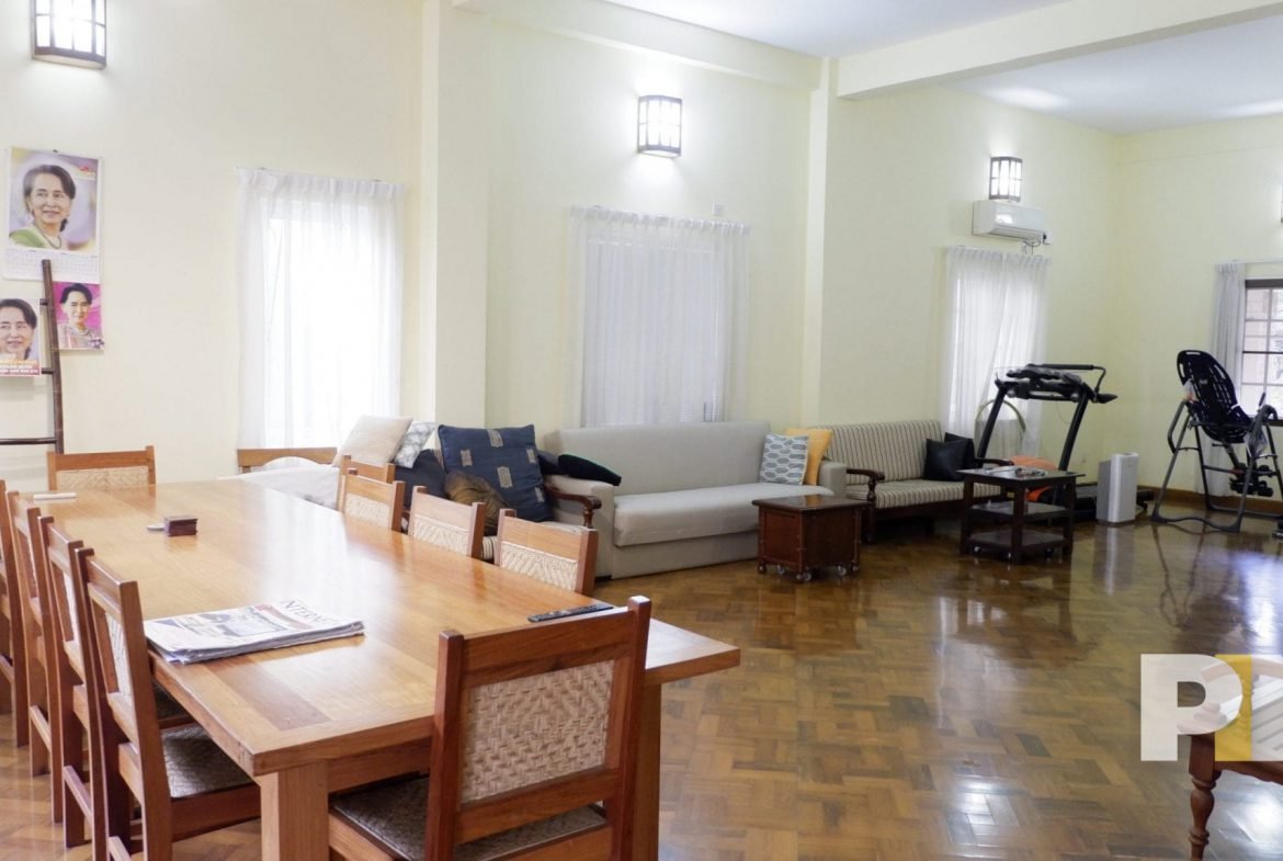 living room with tables and chairs set - Yangon Real Estate