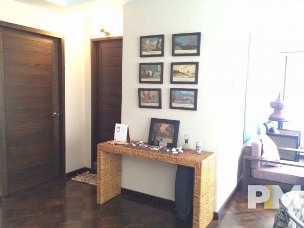 living room with wall arts - Yangon Real Estate