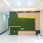 living room with wall shelf - property in Myanmar