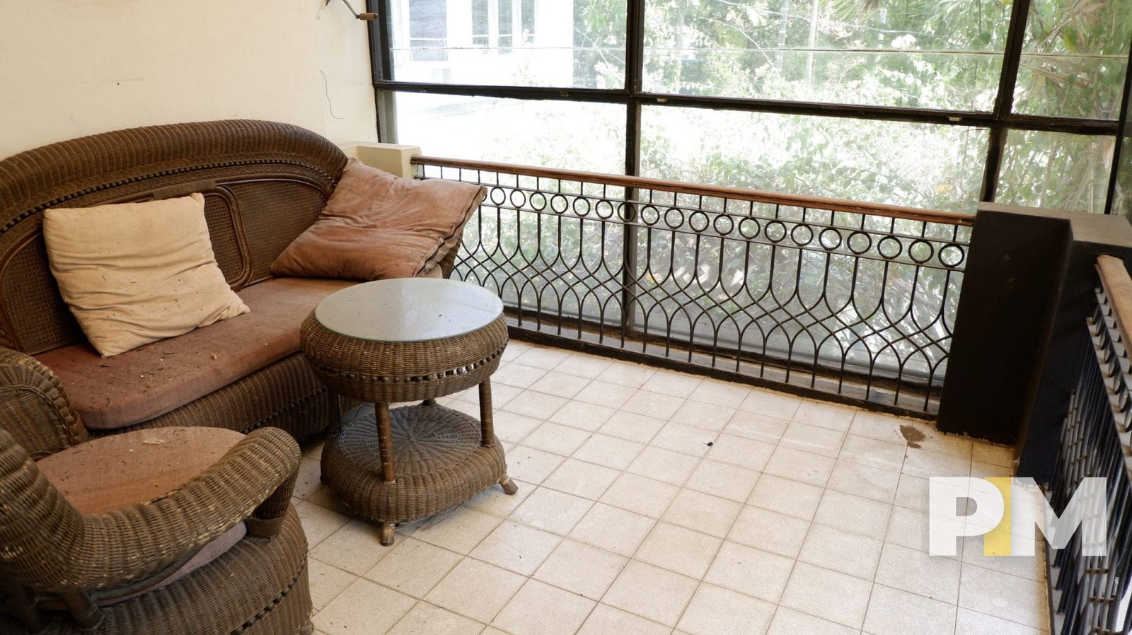 living room with wooden sofa set - Myanmar Real Estate