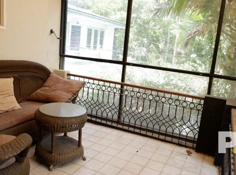 living room with wooden sofa set - Yangon Real Estate