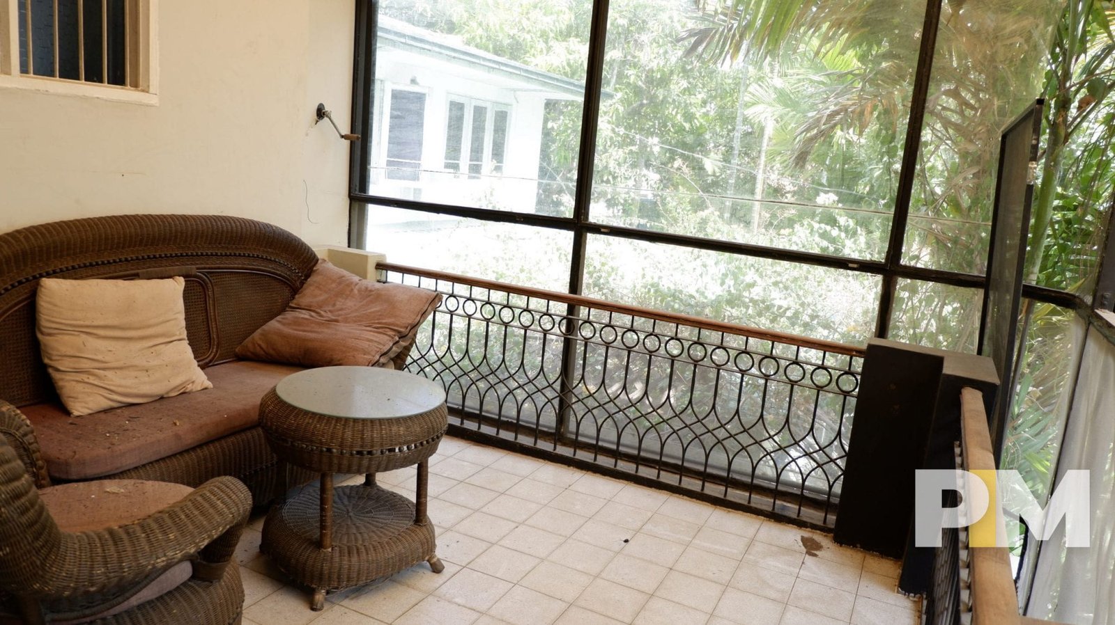 living room with wooden sofa set - Yangon Real Estate