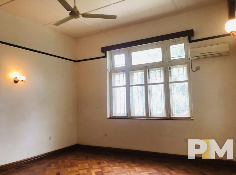 room with ceiling fan - property in Yangon