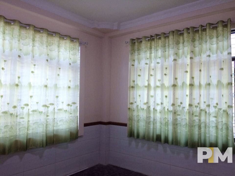 room with curtains - property in Myanmar