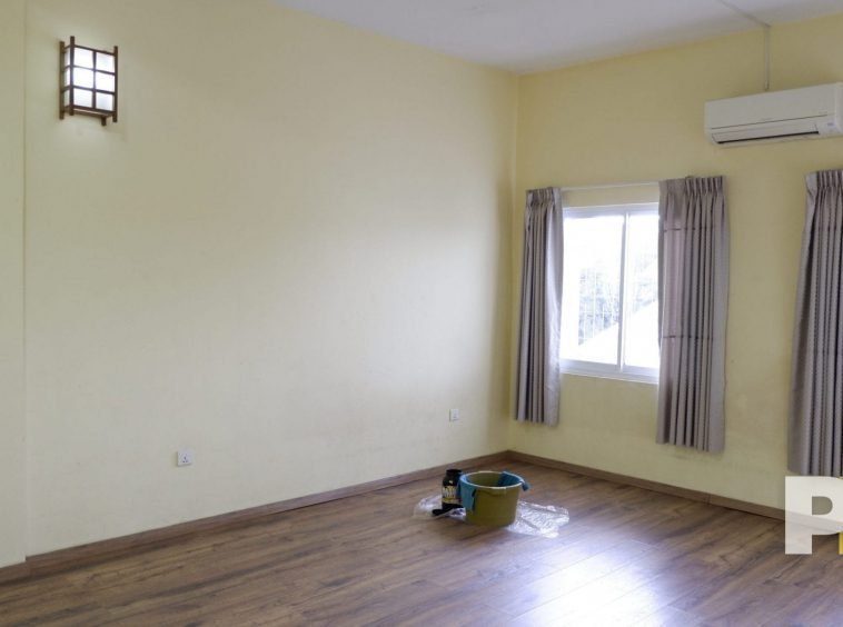 room with windows and curtains - property in Myanmar