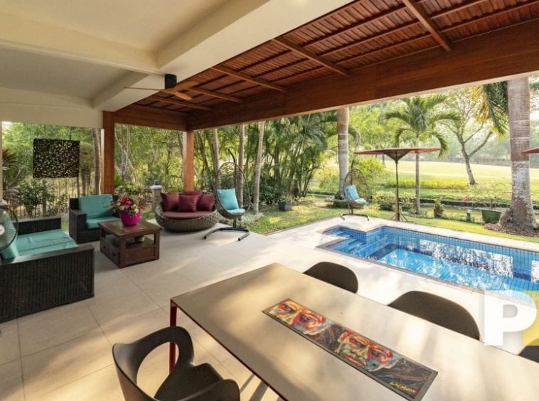 swimming pool with outdoor seats - Yangon Real Estate