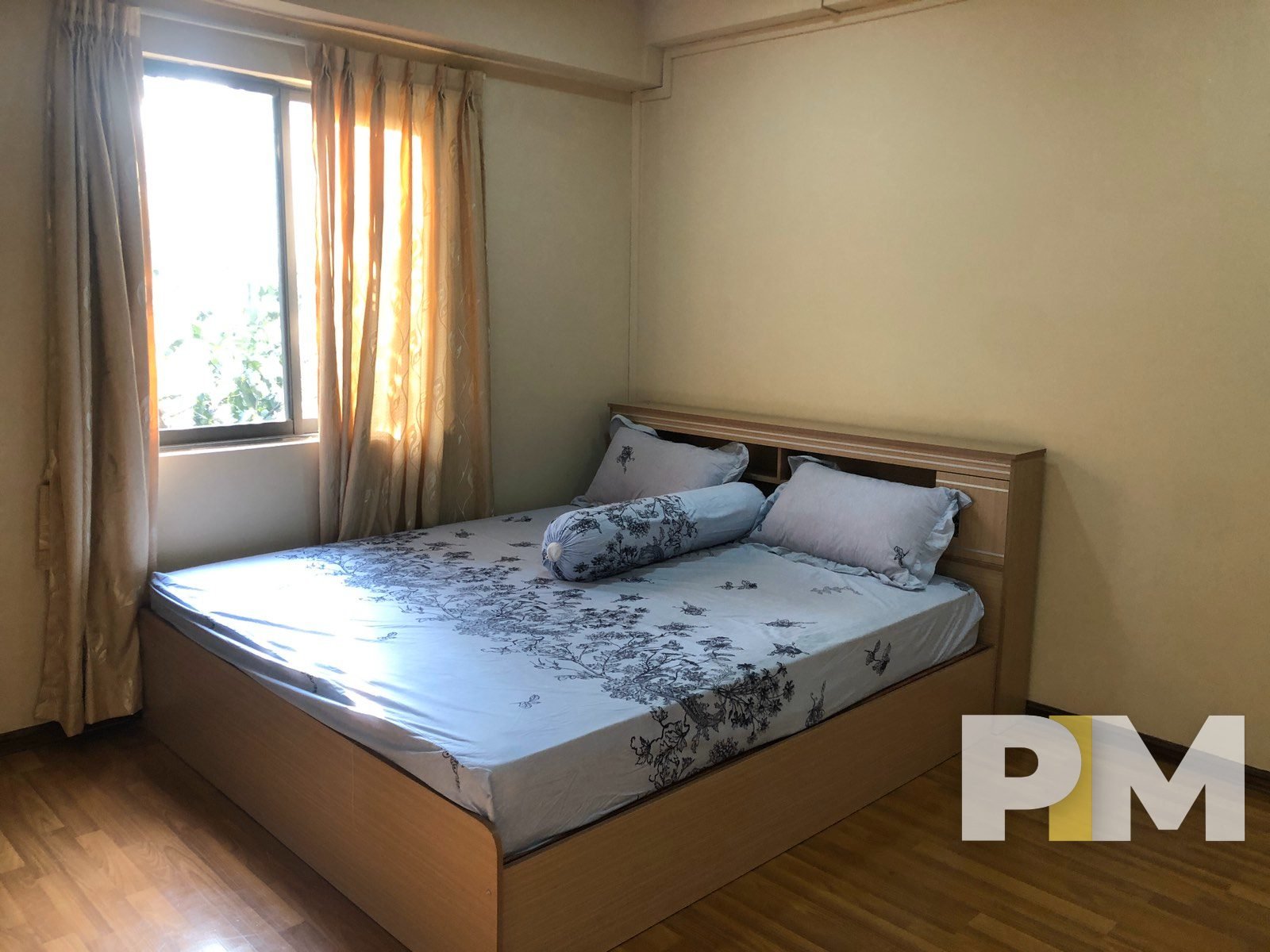 bedroom with curtains - Rent in Yangon