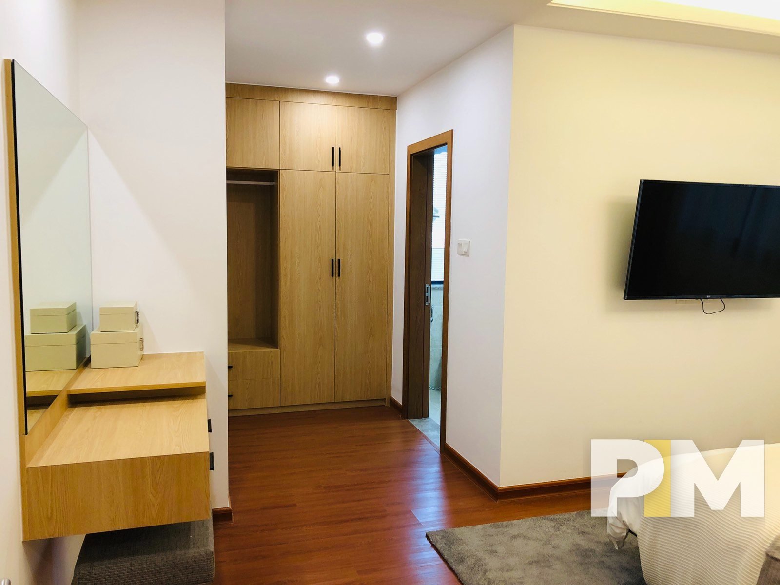 bedroom with TV - properties in Yangon